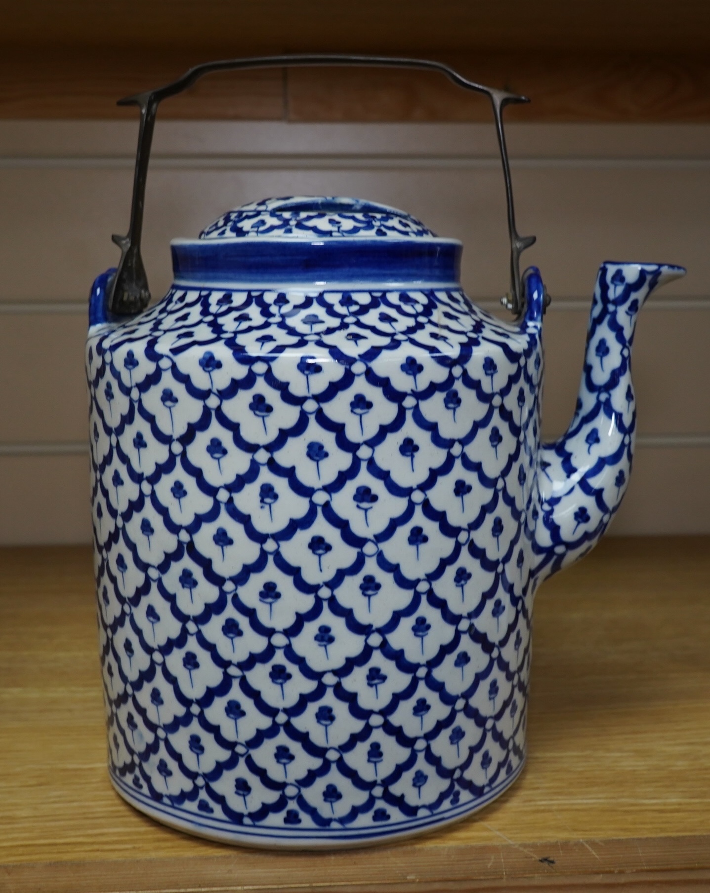 A large Chinese porcelain blue and white teapot, 28cm total. Condition - good